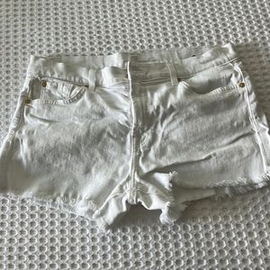 Barely worn, white cut-off shorts. Size 30. 7 for all mankind.